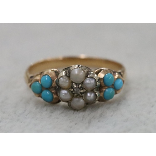 290 - A Victorian gold ladies' ring set with centre floral motif, inset with small diamond surrounded by h... 