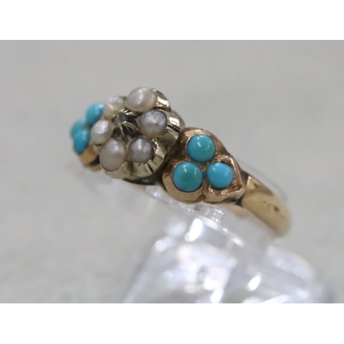 290 - A Victorian gold ladies' ring set with centre floral motif, inset with small diamond surrounded by h... 