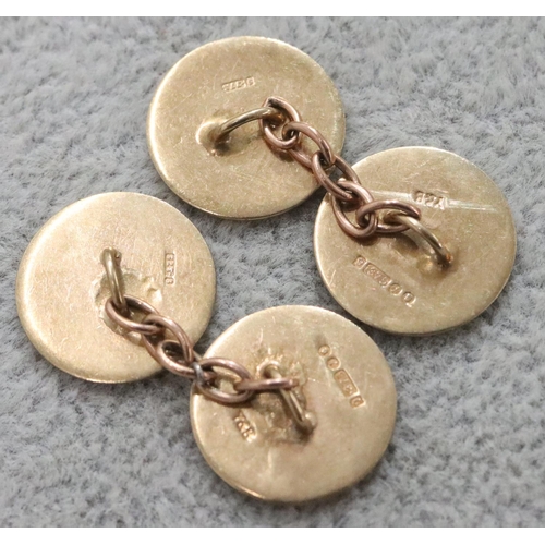 297 - A pair of 9ct gold circular gentlemen's cufflinks with engraved monograms, 5.2 grams