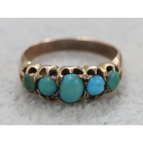 298 - A ladies' gold ring set with 5 turquoise, Size K/L, 2.8 grams gross