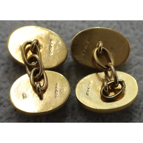 302 - A pair of 9ct gold oval red Cavachon cufflinks, 9.7 grams gross