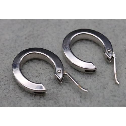 311 - A pair of 9ct white gold half hoop drop earrings, 1.9 grams