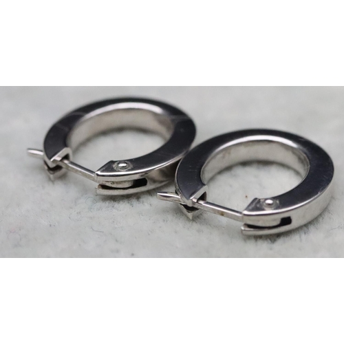 311 - A pair of 9ct white gold half hoop drop earrings, 1.9 grams