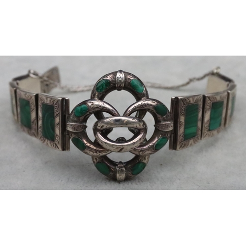 321 - A silver panel bracelet mounted with malachite with pierced scallop shaped centre