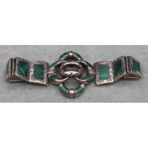 321 - A silver panel bracelet mounted with malachite with pierced scallop shaped centre