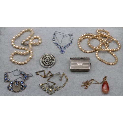 324 - A paste drop necklace set with blue stones, a silver plated vesta case in the form of a book and a s... 