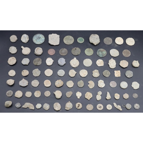 340 - A large quantity of various unearthed metal detected finds including medals, token, coins etc.