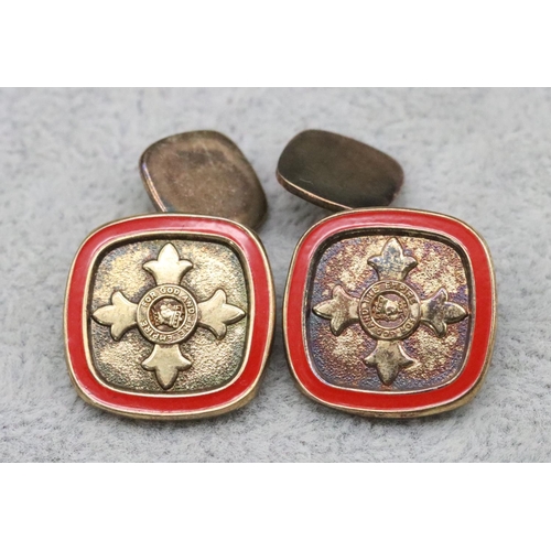 343 - A pair of silver and enamelled OBE cufflinks 