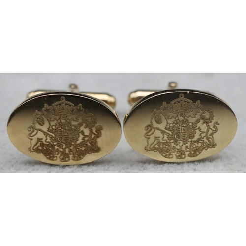 344 - A pair of Mapping & Webb silver gilt gentlemen's oval cufflinks, engraved with British Coat of Arms ... 