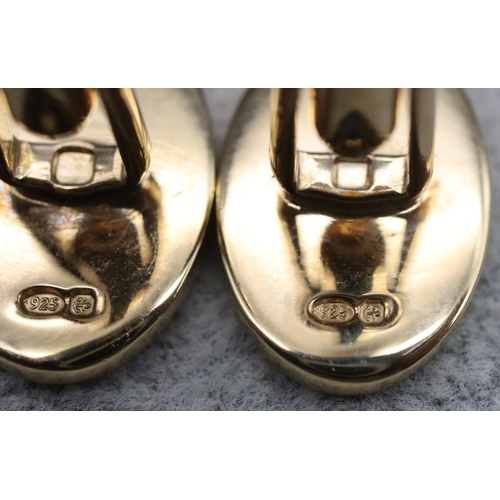 344 - A pair of Mapping & Webb silver gilt gentlemen's oval cufflinks, engraved with British Coat of Arms ... 