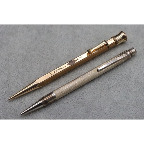 345 - A silver Eversharp propelling pencil with engine turned decoration, a Morden Eversharp gold plated p... 