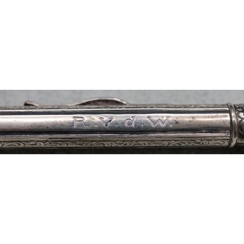 346 - A Continental 835 silver coloured metal propelling pencil with bright cut decoration and a Waterman ... 