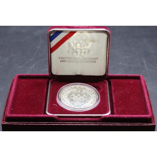 348 - An American silver Dollar, 1988 Olympics (cased and boxed)