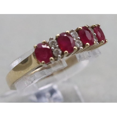 365 - A 9ct gold ladies' ring set with 4 rubies interspersed by 6 small diamonds, Size N/O, 2.6 grams