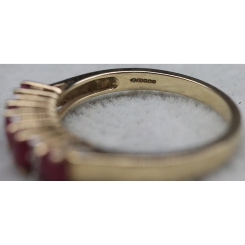 365 - A 9ct gold ladies' ring set with 4 rubies interspersed by 6 small diamonds, Size N/O, 2.6 grams