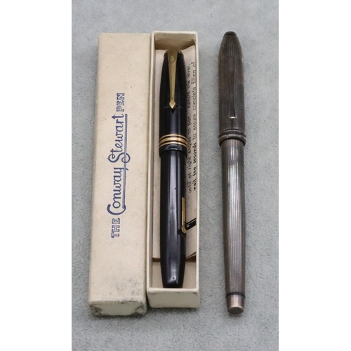 381 - A Conway Stewart 58 black fountain pen (boxed) and a silver Cross ballpoint pen (2)