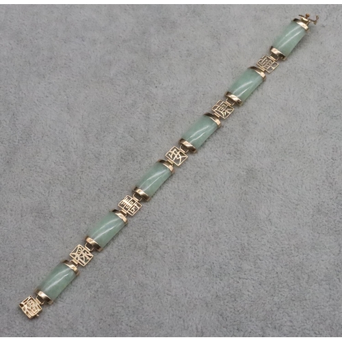 386 - A 9ct gold and jade panel bracelet, 18cm long