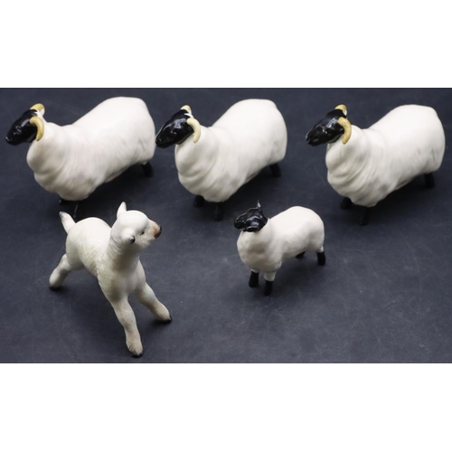 39 - 4 various Beswick figures of sheep and lambs and another similar Beswick lamb (5)