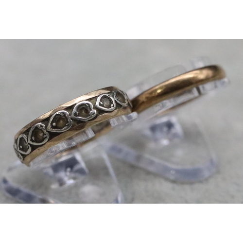 390 - A 9ct gold wedding ring, Size L/M, 1.9 grams and another gold and silver eternity ring, overall weig... 