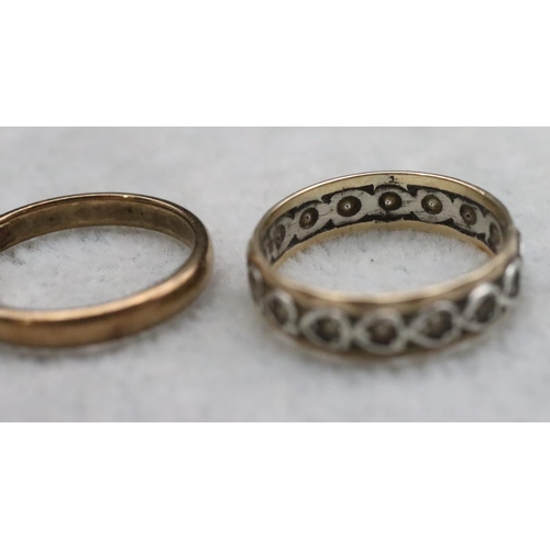 390 - A 9ct gold wedding ring, Size L/M, 1.9 grams and another gold and silver eternity ring, overall weig... 