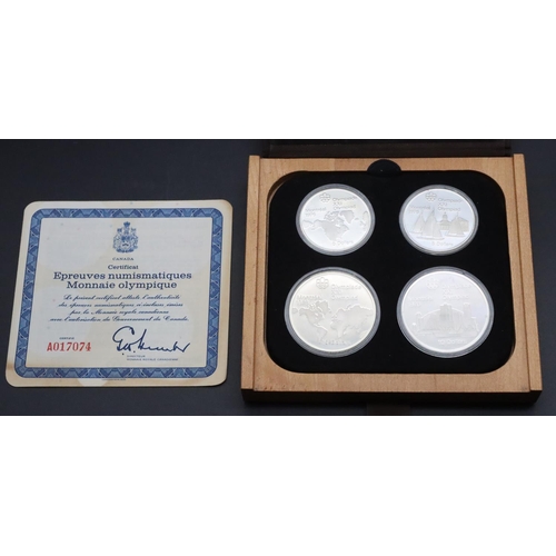 395 - A set of 4 Olympic coin proofs, 1973, with certificate and boxed