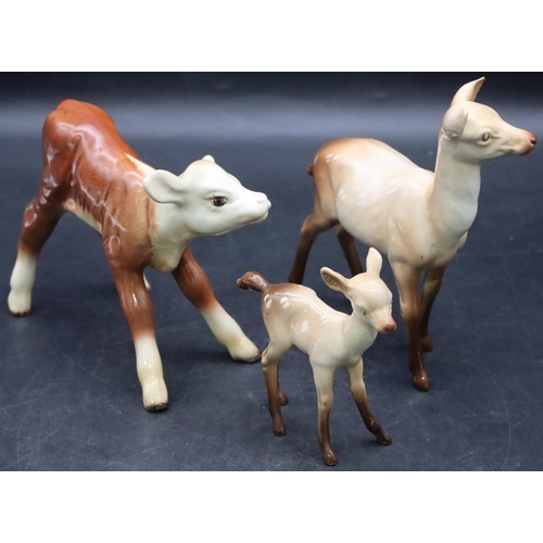 40 - A Beswick figure of a Doe with her young, 15cm high and a Beswick figure of a calf, 12cm high (3)