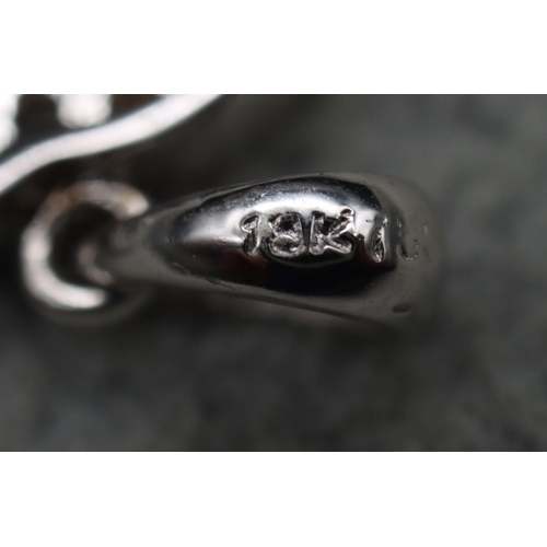 408 - An 18ct white gold pendant in the form of 2 entwined C's, inset with diamonds, 1.5cm high, 1.9 grams... 