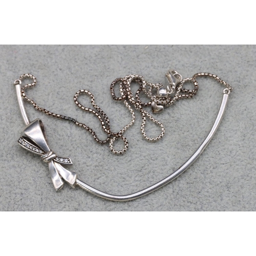 416 - A silver Pandora necklace with ribbon motif and square linked chain, 47.5cm long