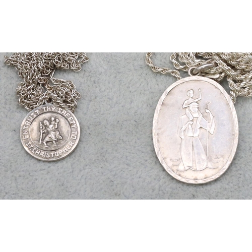 421 - A silver oval St Christopher with chain, another similar St Christopher with chain and 7 various sil... 