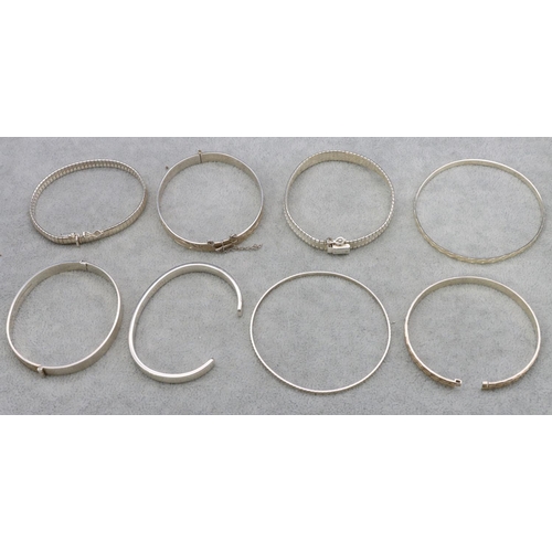 423 - 8 various silver bangles, 110 grams