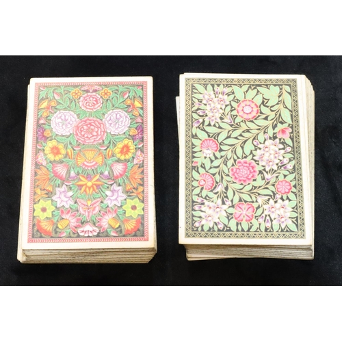 428 - 2 packs De la Rue London playing cards with multi-coloured floral and leaf decoration, both sets com... 