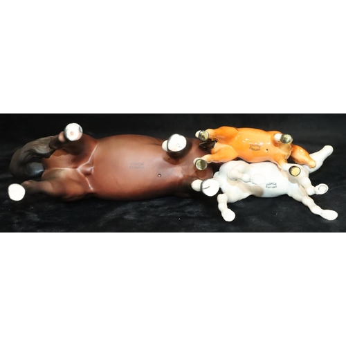 43 - A Beswick mat figure of a horse on brown ground, 21cm high, a Beswick mat figure of a foal on white ... 