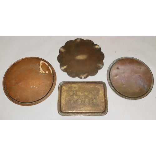 438 - 4 various copper and brass Islamic trays with allover embossed and engraved decoration, including a ... 