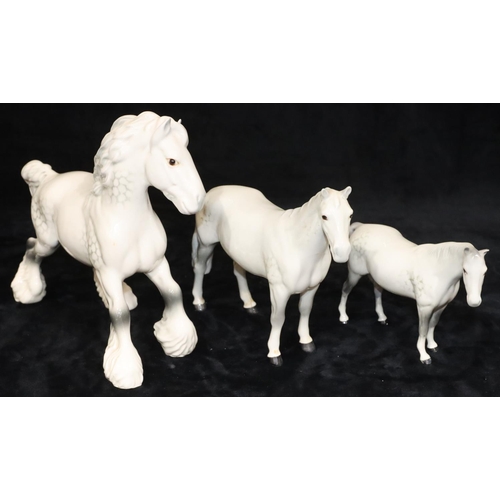 44 - A Beswick figure of a Shirehorse on white ground, 21.5cm high and 2 further Beswick figures of white... 