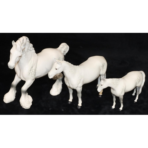 44 - A Beswick figure of a Shirehorse on white ground, 21.5cm high and 2 further Beswick figures of white... 