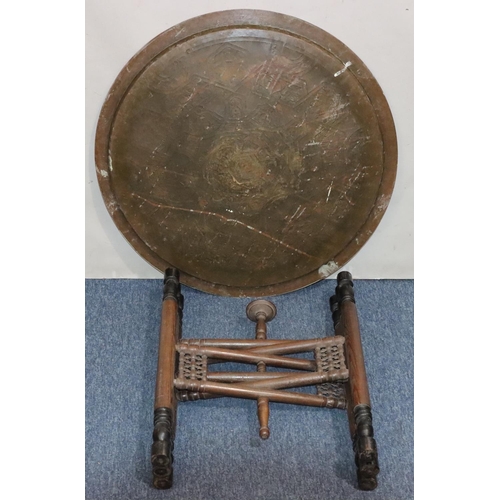 440 - An Islamic round brass coffee table with inlaid copper and silvered decoration, 70cm diameter, with ... 