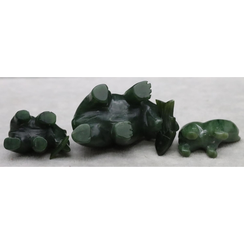 441 - A jade style figure of a polar bear, 2 smaller similar figures and a jade drop pendant with cord nec... 