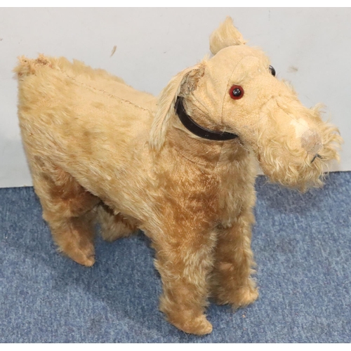 451 - An early Chiltern child's toy figure of a dog (no stand and in need of restoration), 47cm high, 53cm... 