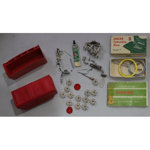 452 - A Singer 22K electric sewing machine, cased, with various accessories, instruction manual etc. (bar ... 