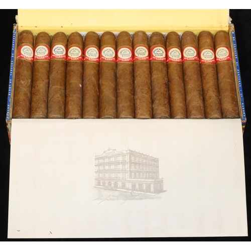 453 - A boxed set of Flor de Tabacos d Partagas Havana, 25 handmade cigars, numbered 520 (boxed) box has b... 