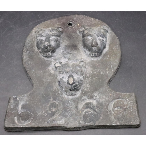 460 - A lead Fire Insurance Mark with 3 raised animal motifs, numbered 5266, 9cm high