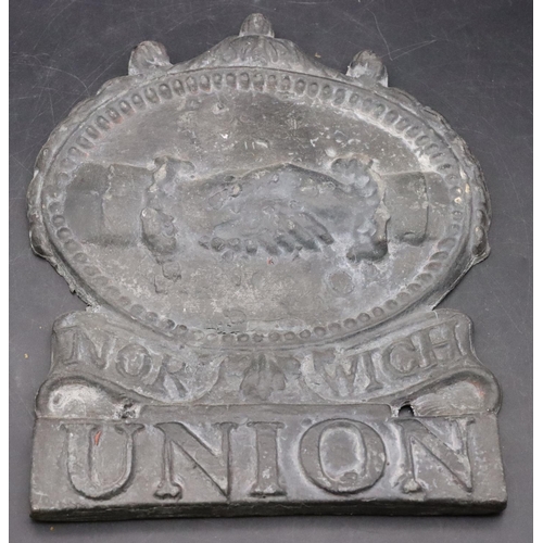 464 - A Norwich Union lead Fire Insurance Mark with raised shaking hand motif, 23cm high, a lead Fire Insu... 