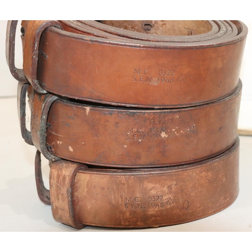 470 - 3 military large leather horse's belts (all stamped M.C S.E.N 1948), 2 wooden stirrups, a whip and a... 