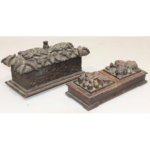 472 - A carved oak rectangular shaped box with allover raised branch, acorn and leaf decoration and hinged... 