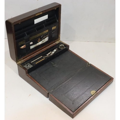 477 - A 19th Century Irish leather and wooden travelling writing box, stamped 