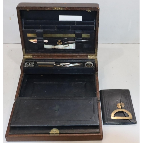 477 - A 19th Century Irish leather and wooden travelling writing box, stamped 