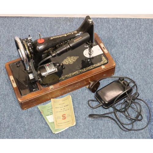 480 - A Singer 99K electric sewing machine with motor (cased), with accessories and instruction books