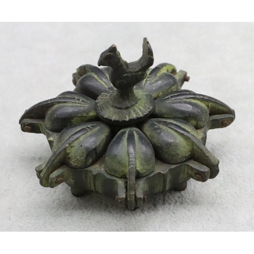 485 - A small Eastern bronze spice box with bird centre motif, 7.5cm wide