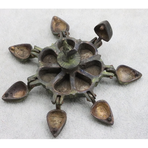 485 - A small Eastern bronze spice box with bird centre motif, 7.5cm wide