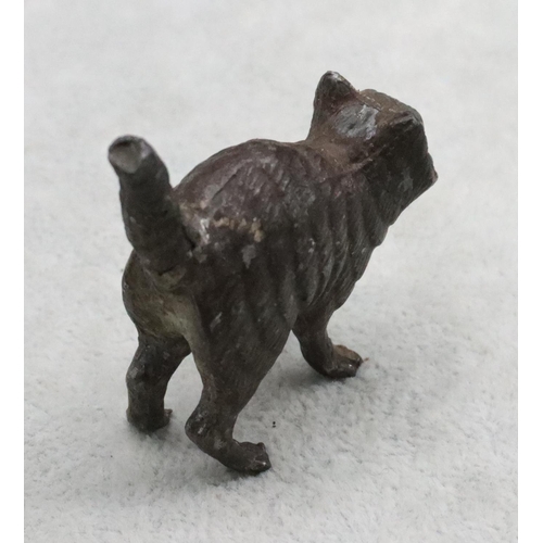 487 - A cold painted bronze style figure of a cat, 5cm long